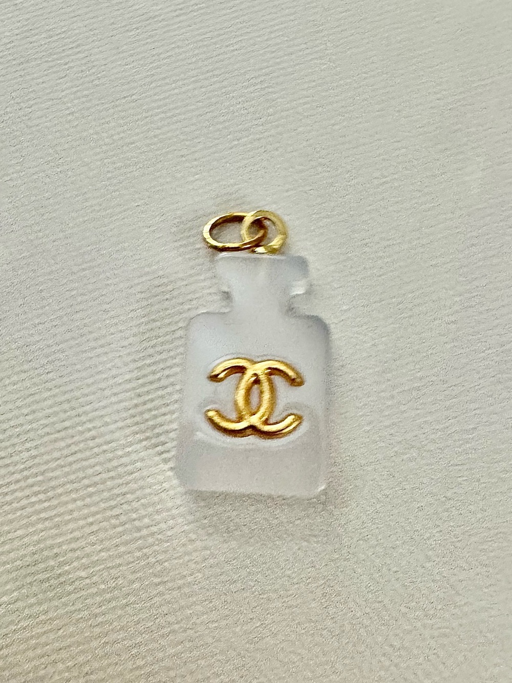 CHANEL Frosted Clear Perfume Bottle Charm with Gold CC Emblem